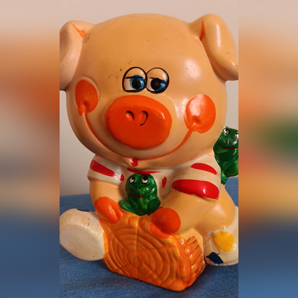 Vintage Chalkware Piggy Bank. Cute Piggy sitting on a log with froggy friends.